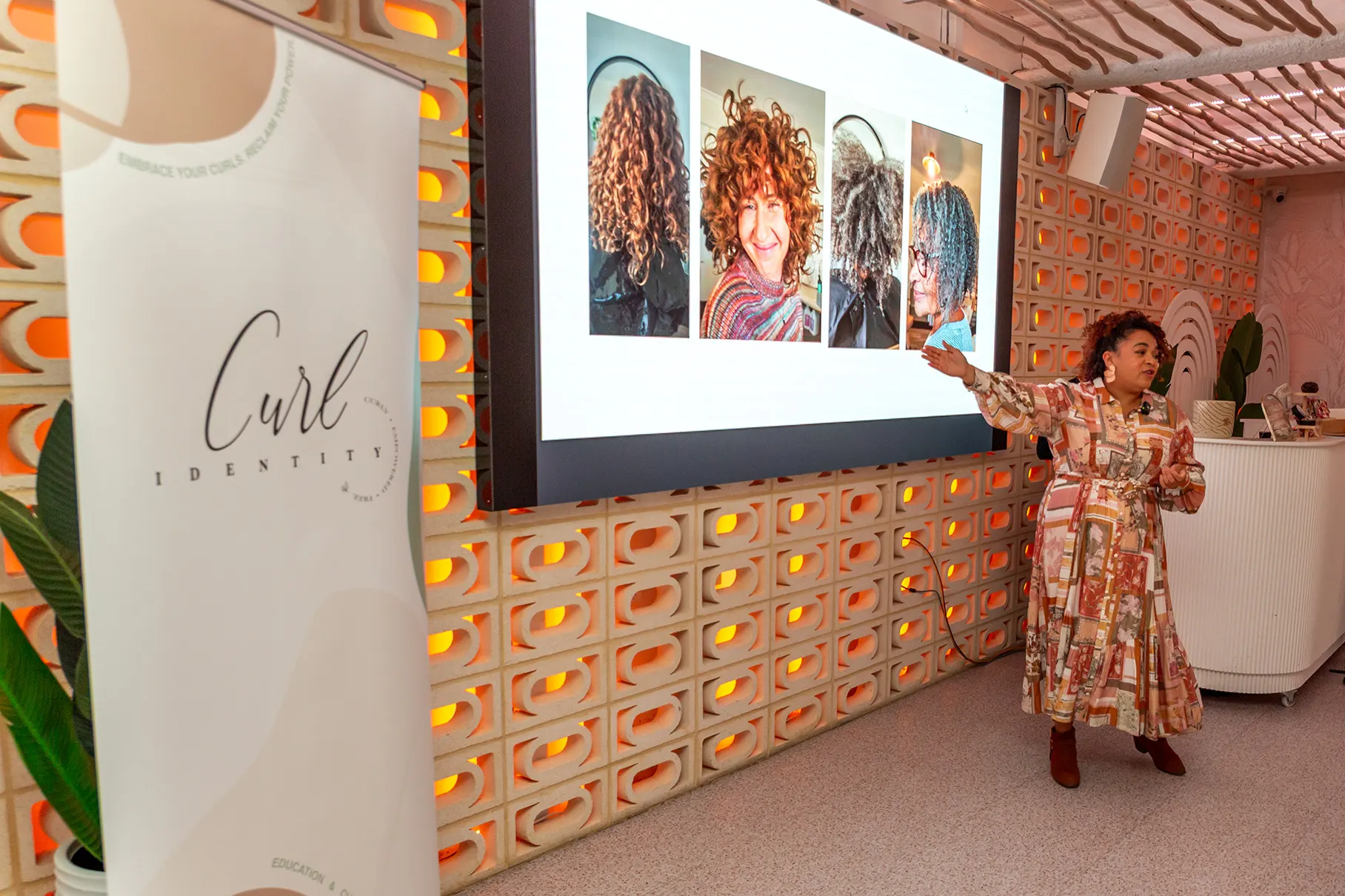 Caroline Smalley speaking at the Curls Connection event